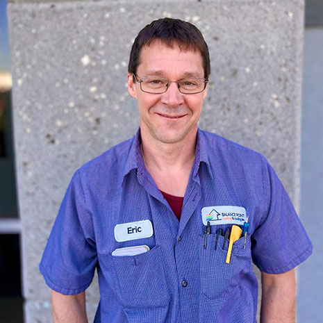 Eric wearing his blue Balance Point technician shirt